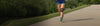 Woman running with knee brace on