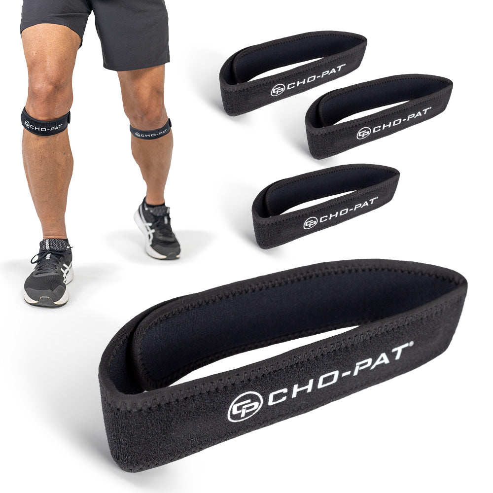 Four black Cho-Pat Patella knee straps shown worn below the knee and laid flat