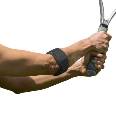 Cho-Pat Tennis Elbow Support on a  woman holding a tennis raquet