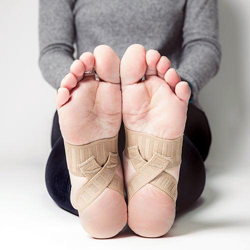 Bottom of feet wearing Tuli's X Brace