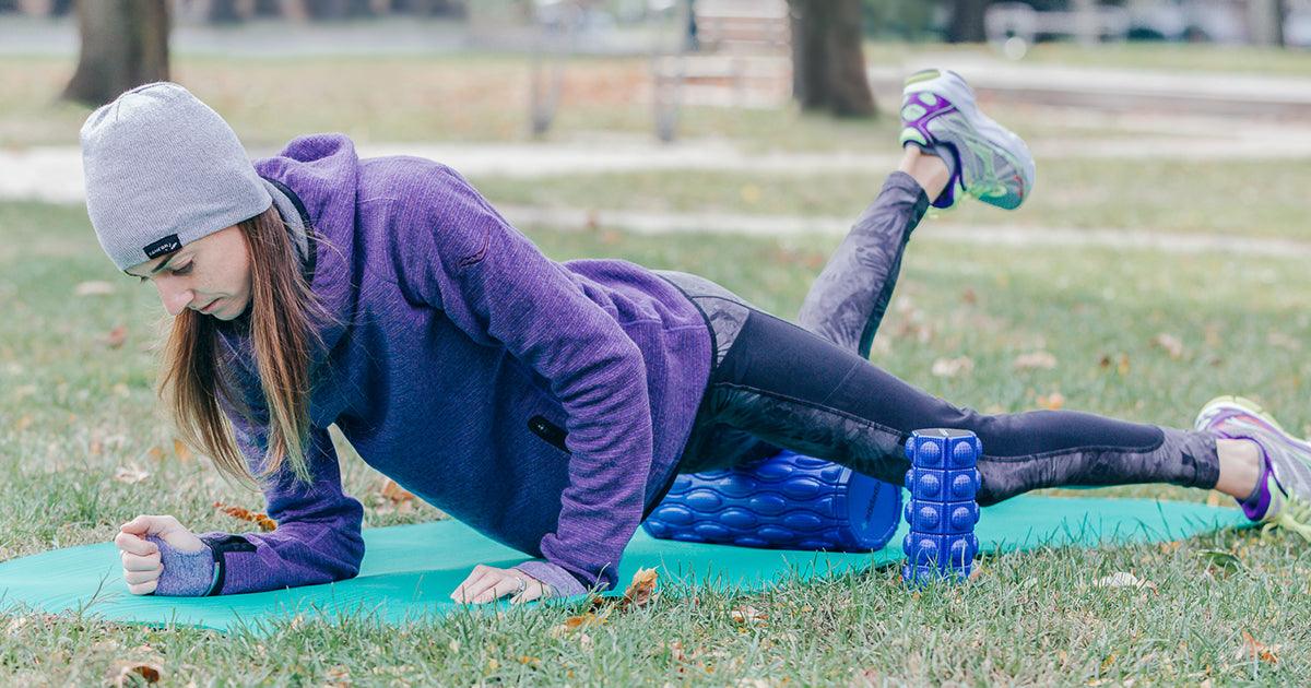 lady foam rolling leg