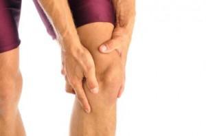 Man suffering from knee pain