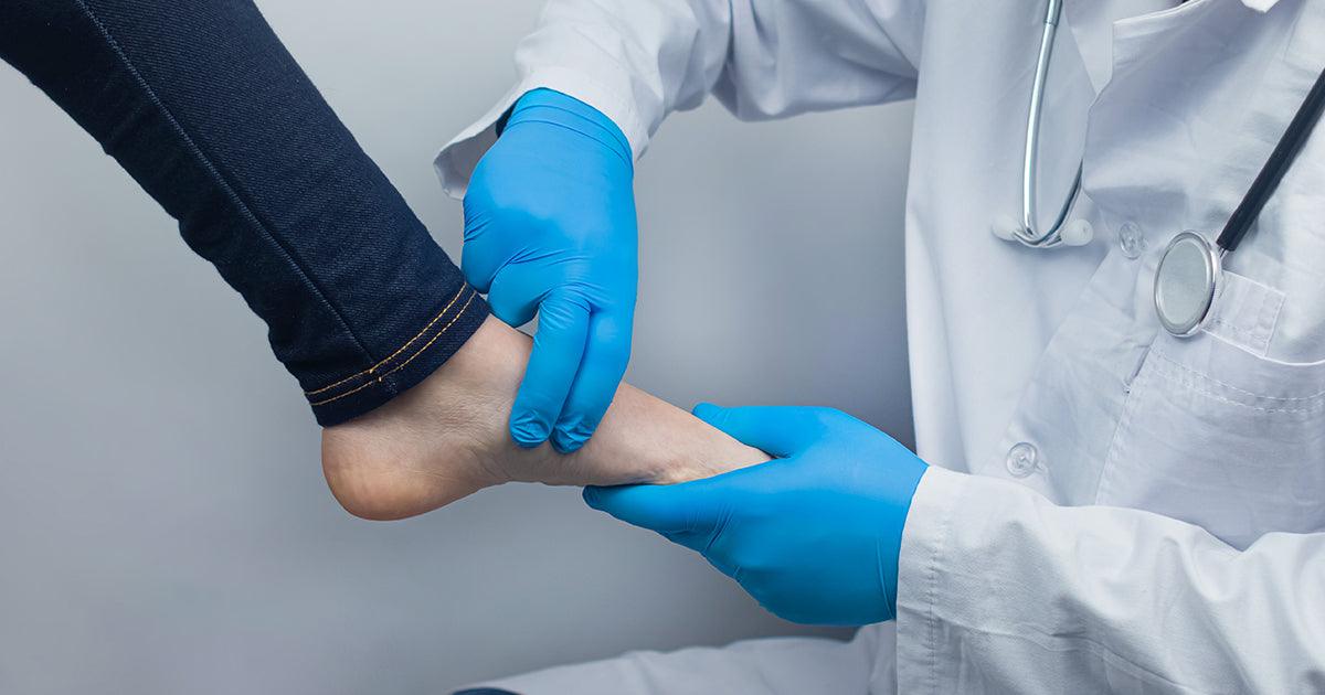 Doctor analyzing foot