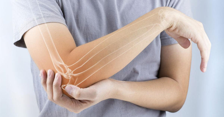 arm with elbow tenonitis pain