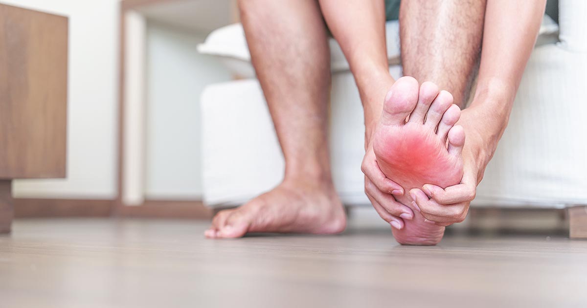 Men suffering from plantar fasciitis firts step in the morning