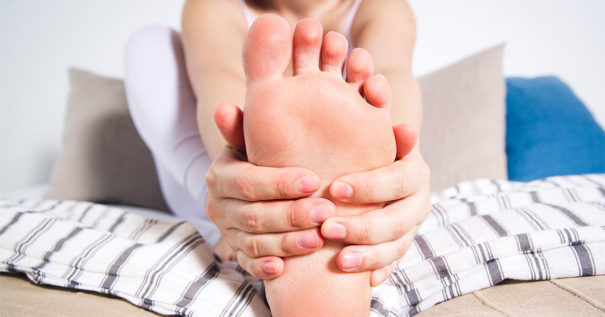 Lady with foot pain such as plantar fasciitis