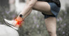 Women runner with Achilles tendon pain