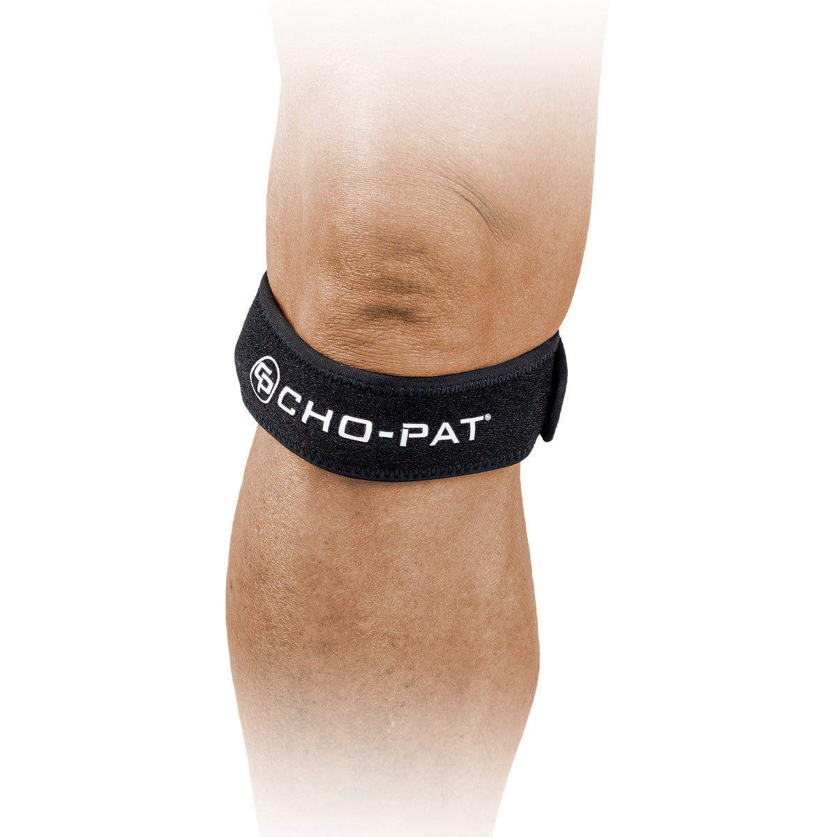 Cho-Pat Patella Knee Strap worn below the kneecap, shown in a close-up side view.