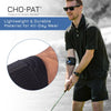 Man outside playing golf wearing the Cho-Pat Golfer's elbow support. Lightweight and durable material for all-day wear