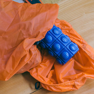 The Hexi Mini Foam Roller is small enough to fit any bag.