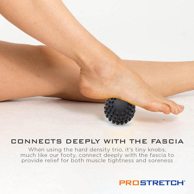 Massaging foot using a ProStretch Trio massage ball